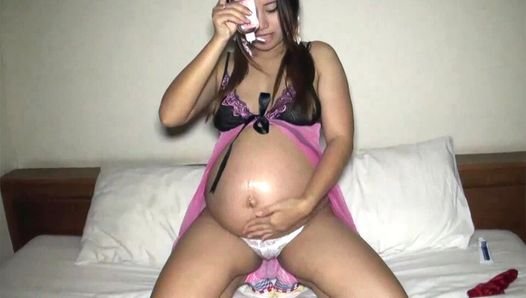 9 months pregnant Asian amateur Pat gets her wet preggo pussy fucked